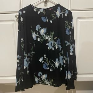 Women’s medium tunic black with blue floral print.